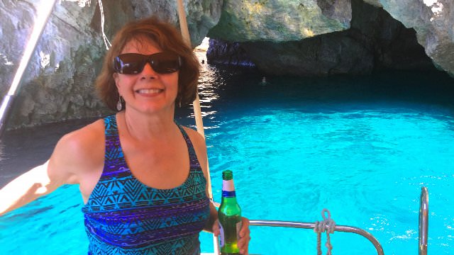 Drinking a cold beer off the coast of Capri Island, Italy in one of the many grottos that dot the coastline. 